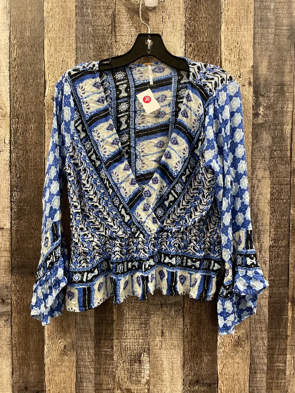 women's tops for those who love to mix and match prints and patternsTop Long Sleeve By Free People In Blue, Size: L